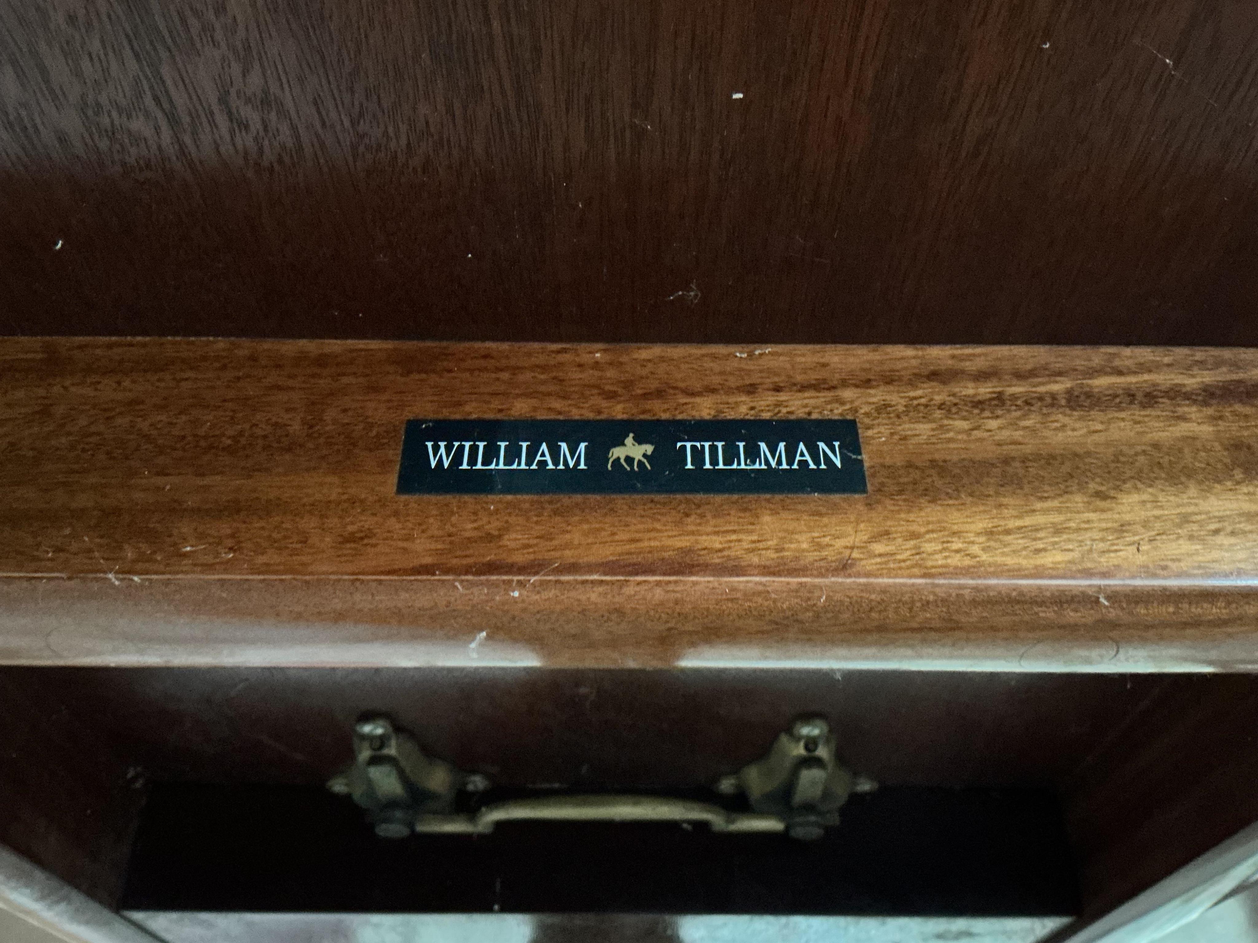 A reproduction William Tillman George III style oval banded mahogany dining table (lacks bolts), width 168cm, depth 120cm, height 72cm